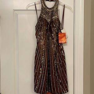 A beautiful cocktail dress brand new for you to enjoy!!